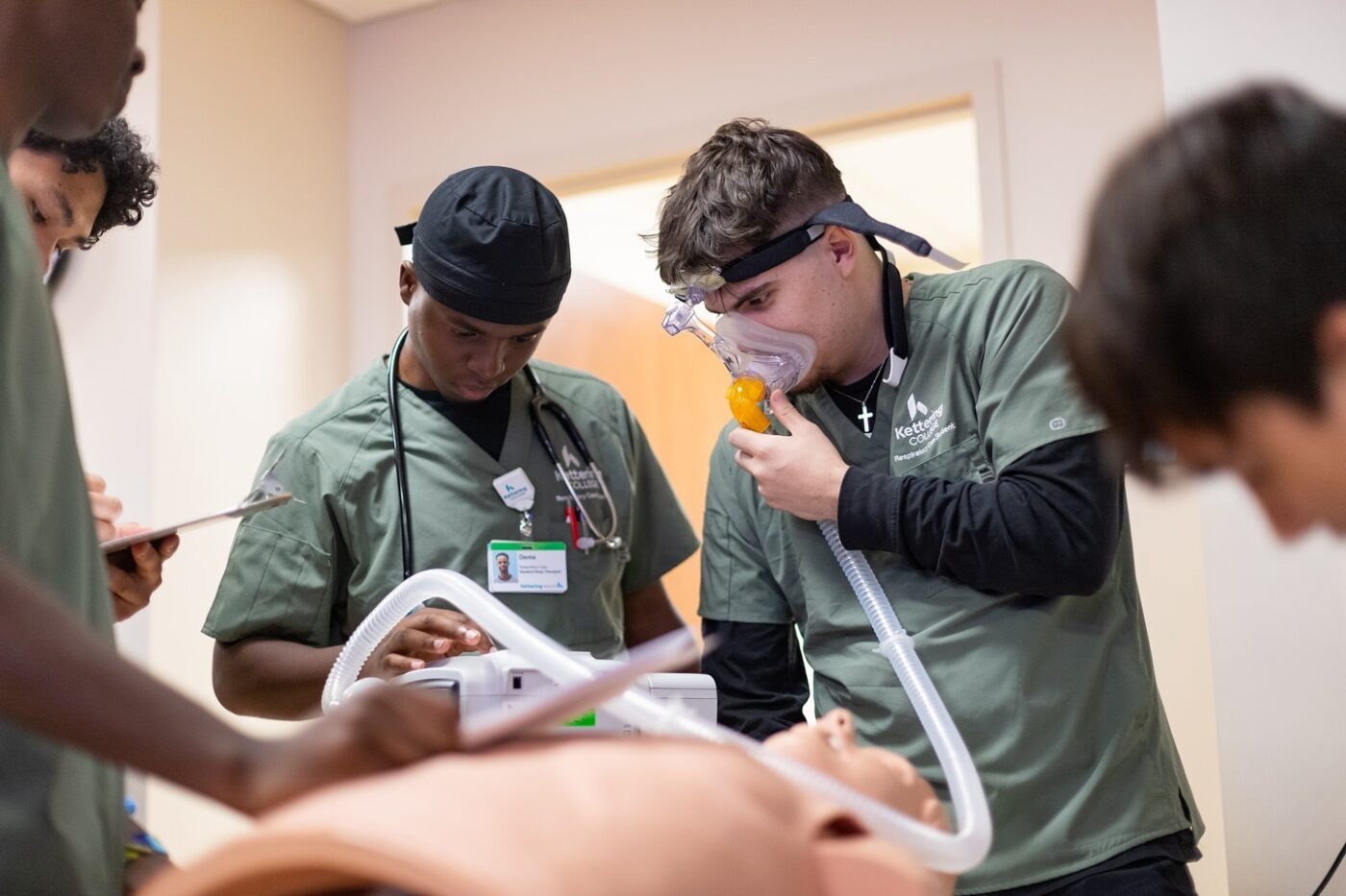 Kettering College Respiratory Care students work in a lab.