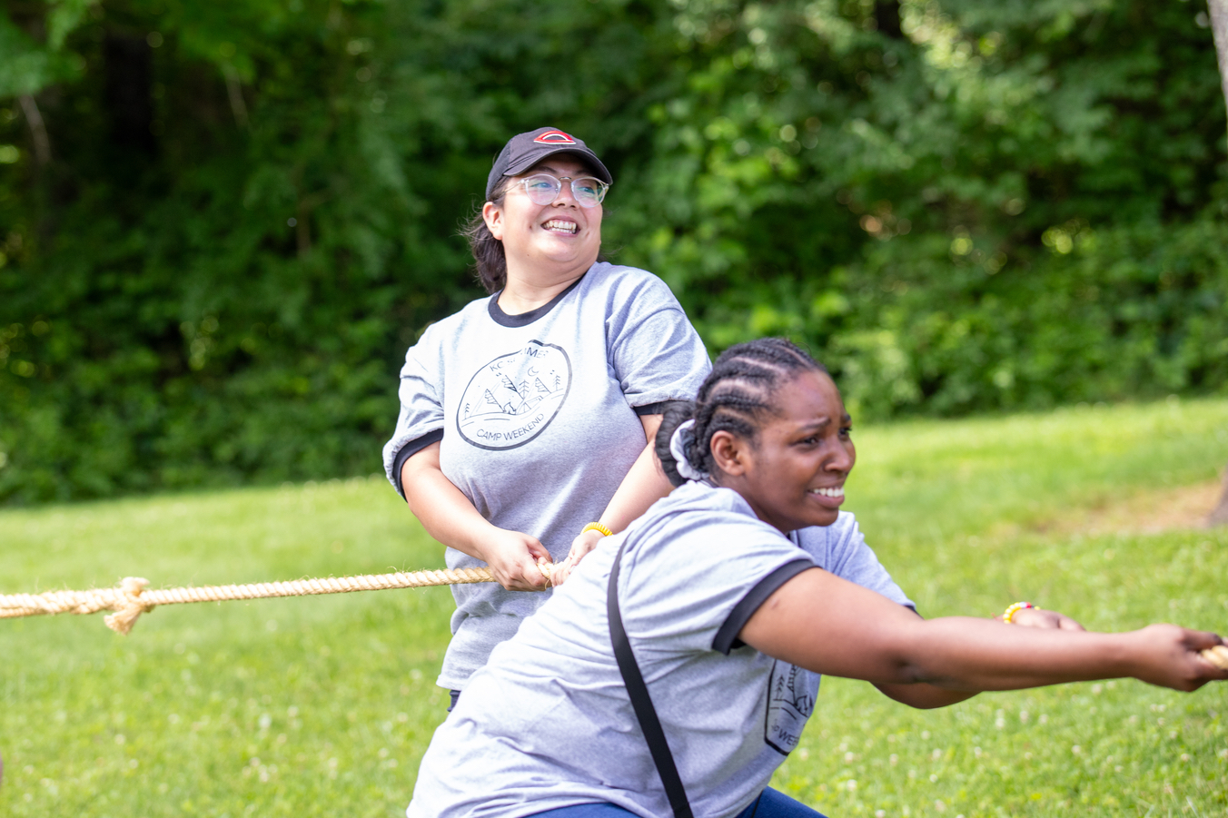 Judith Mendoza, Kettering College chaplain and residence hall director, plays tug of war at a recent camp day for students.