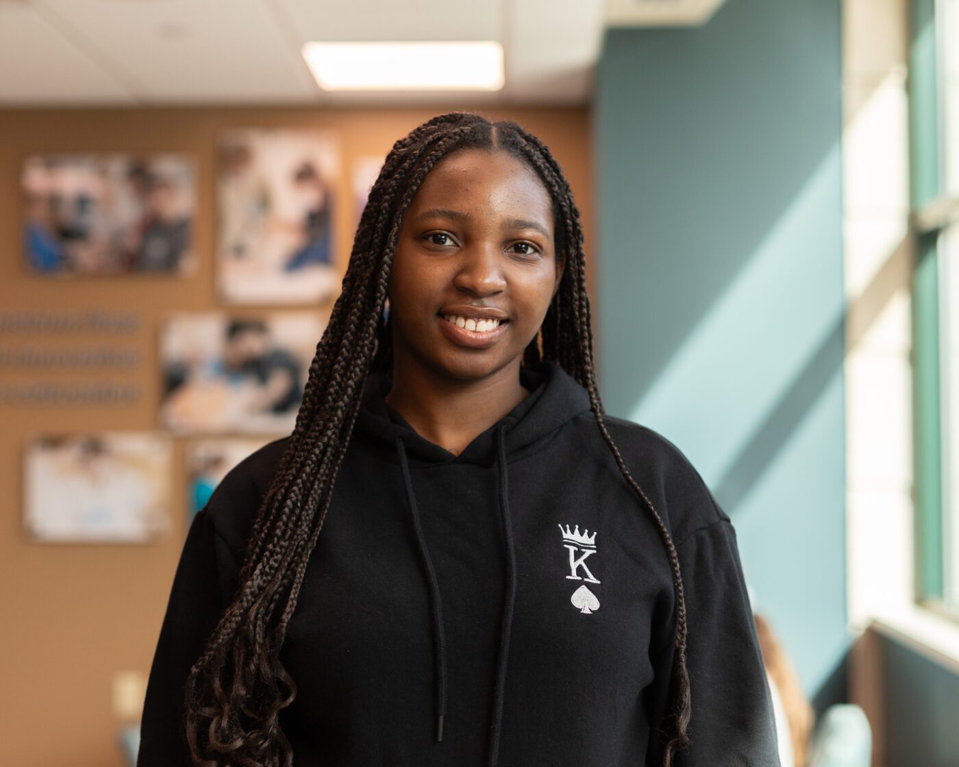 Kettering College Nursing student stands in the learning commons area.